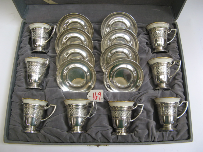 Appraisal: STERLING SILVER AND LENOX PORCELAIN DEMITASSE CUPS in original box