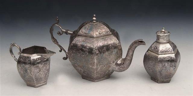 Appraisal: A DUTCH SILVER THREE PIECE TEA SET hexagonal shaped teapot