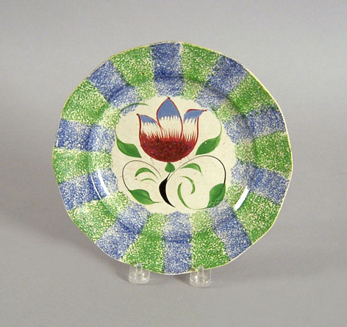 Appraisal: Blue and green rainbow spatter plate th c with tulip