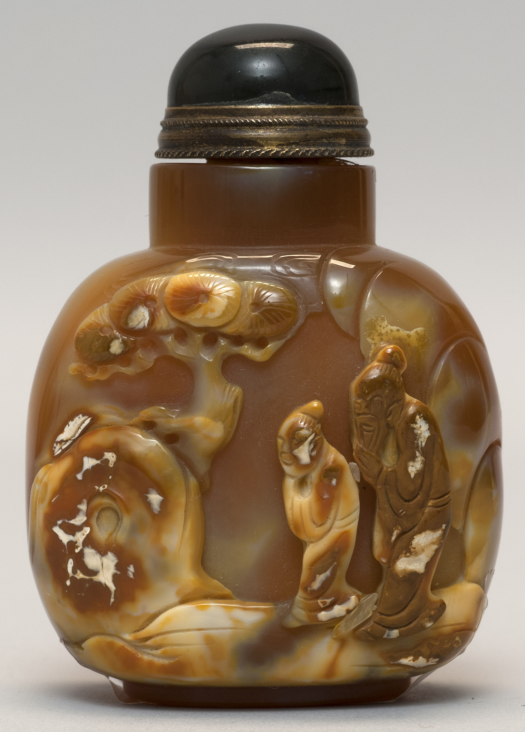 Appraisal: CHALCEDONY AGATE SNUFF BOTTLE th CenturyIn ovoid form with relief-carved