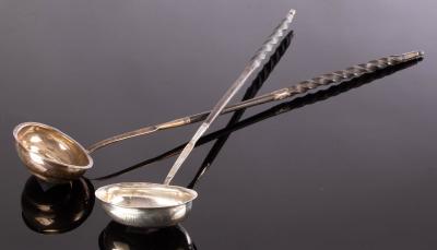 Appraisal: A George III silver toddy ladle London with spiral whalebone