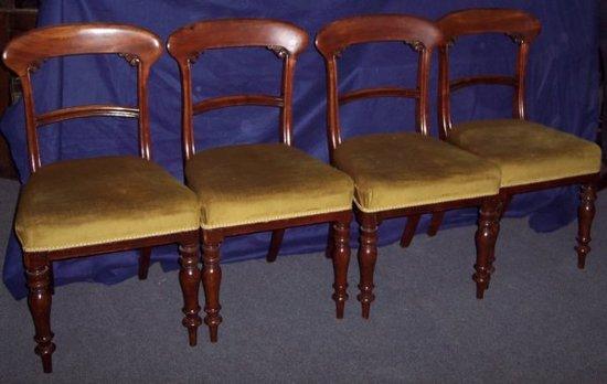 Appraisal: A set of four Victorian mahogany dining chairs raised on