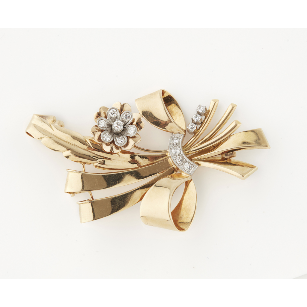 Appraisal: A mid- th century diamond set floral brooch the polished