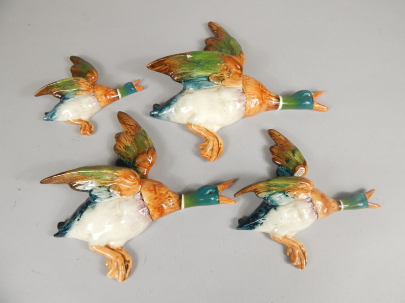 Appraisal: A graduated set of four Beswick flying ducks various printed