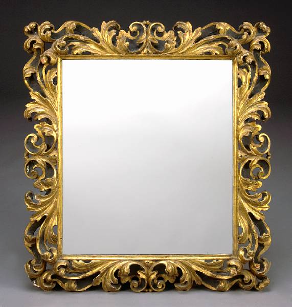 Appraisal: An Italian Rococo style painted and parcel gilt mirror late