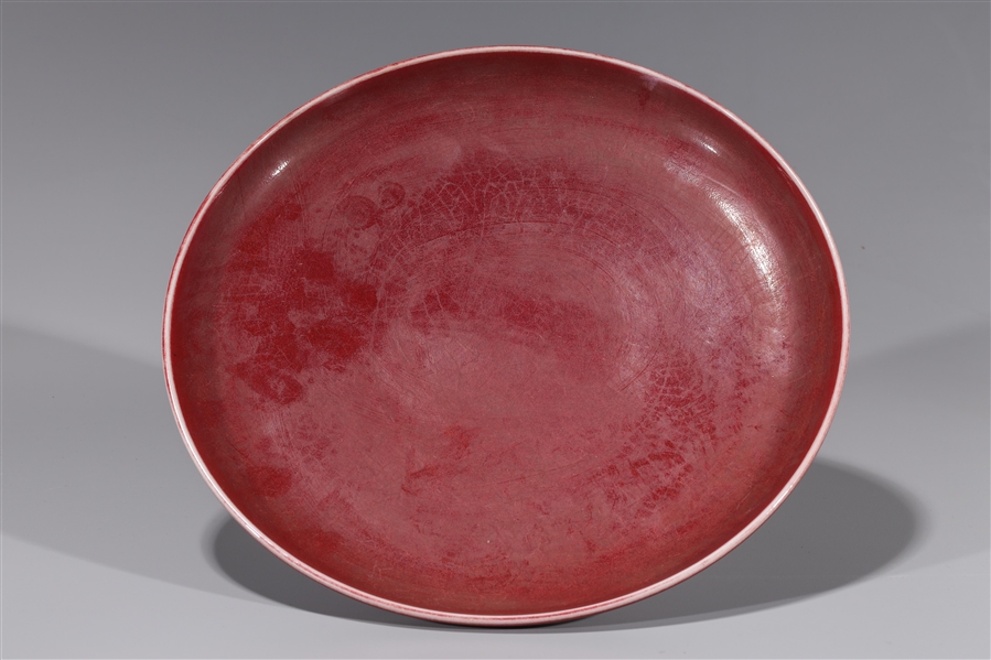 Appraisal: Chinese Qing dynasty style red crackle glaze porcelain dish with