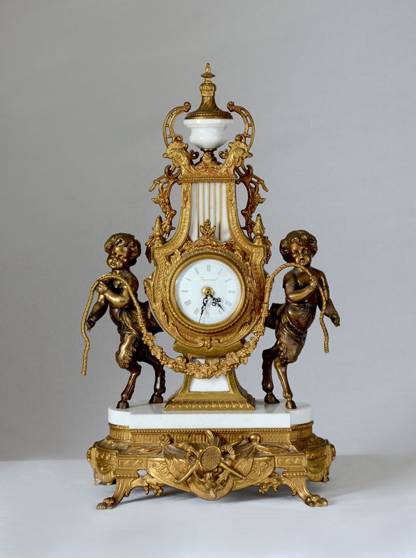 Appraisal: ITALIAN IMPERIAL FIGURAL CLOCK Ornate case with figural pan children