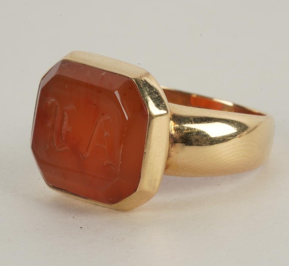 Appraisal: KARAT YELLOW GOLD CARNELIAN INTAGLIO RINGcentering one carved cut-corner rectangular