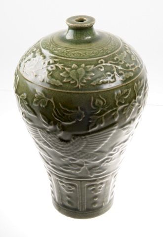 Appraisal: Chinese Carved Celadon Porcelain Vase Chinese carved celadon vase in