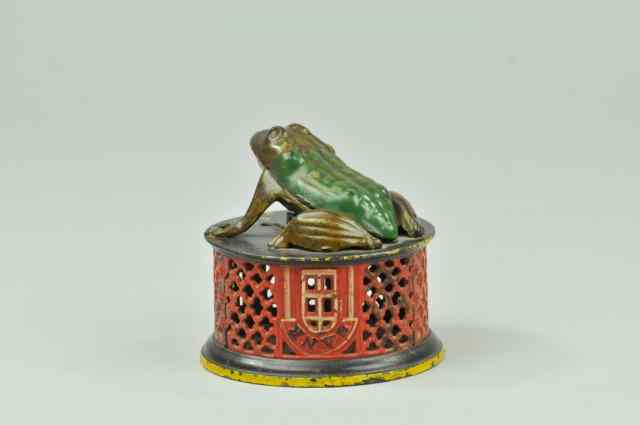 Appraisal: FROG ON LATTICE MECHANICAL BANK Red Base J E Stevens