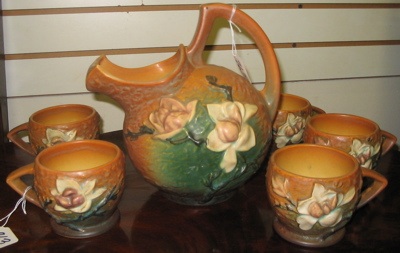 Appraisal: A SIX PIECE ROSEVILLE AMERICAN ART POTTERY CIDER SET in