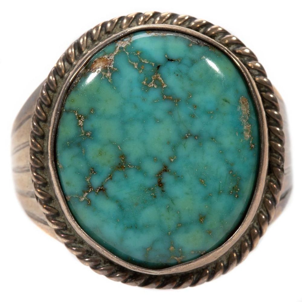 Appraisal: Turquoise and silver ring bezel-set turquoise measuring approximately x mm