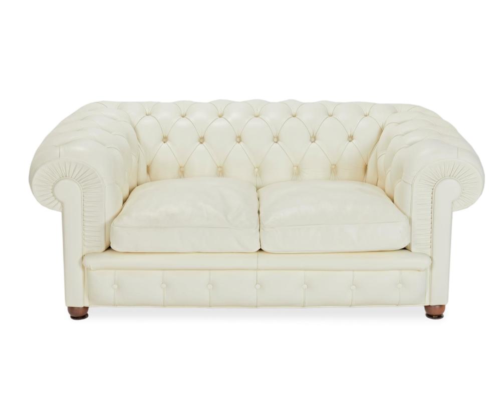 Appraisal: A leather Chesterfield sofa st Century Upholstered in white leather