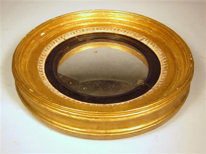 Appraisal: George III giltwood convex mirror early th century