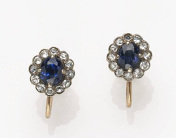 Appraisal: A pair of sapphire white stone k gold and silver