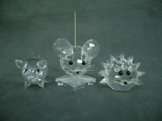 Appraisal: Three pieces Swarovski Crystal including small hedgehog small pig and