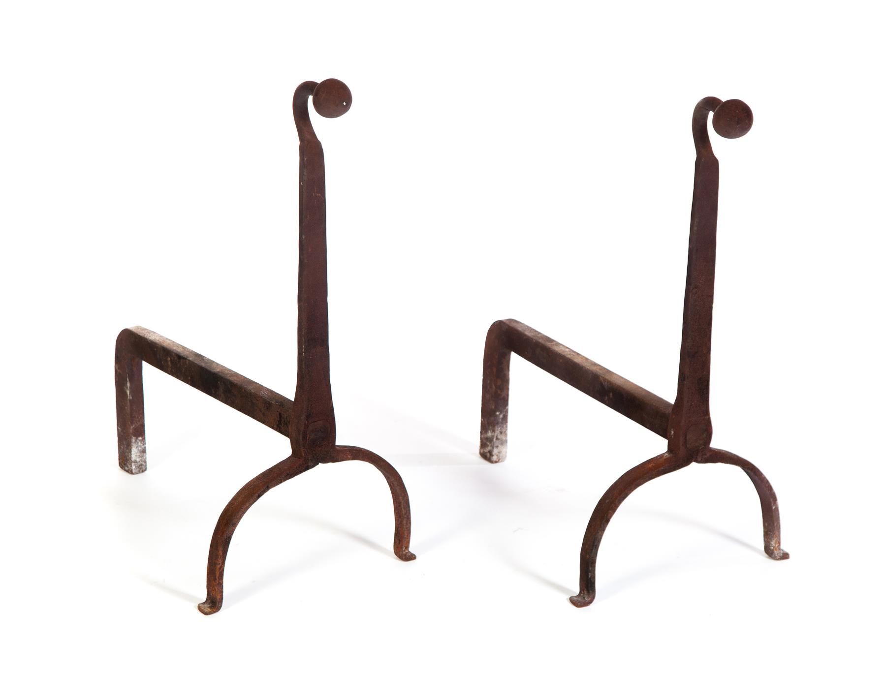 Appraisal: PAIR OF AMERICAN WROUGHT IRON ANDIRONS Nineteenth century Large size