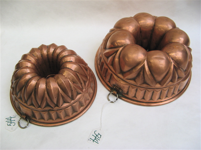 Appraisal: TWO TH CENTURY ROUND COPPER FOOD MOLDS tin lined with