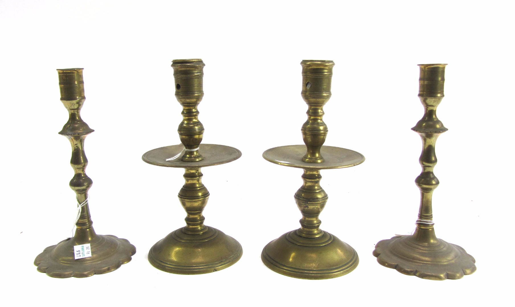 Appraisal: A pair of th century Dutch brass baluster candlesticks with