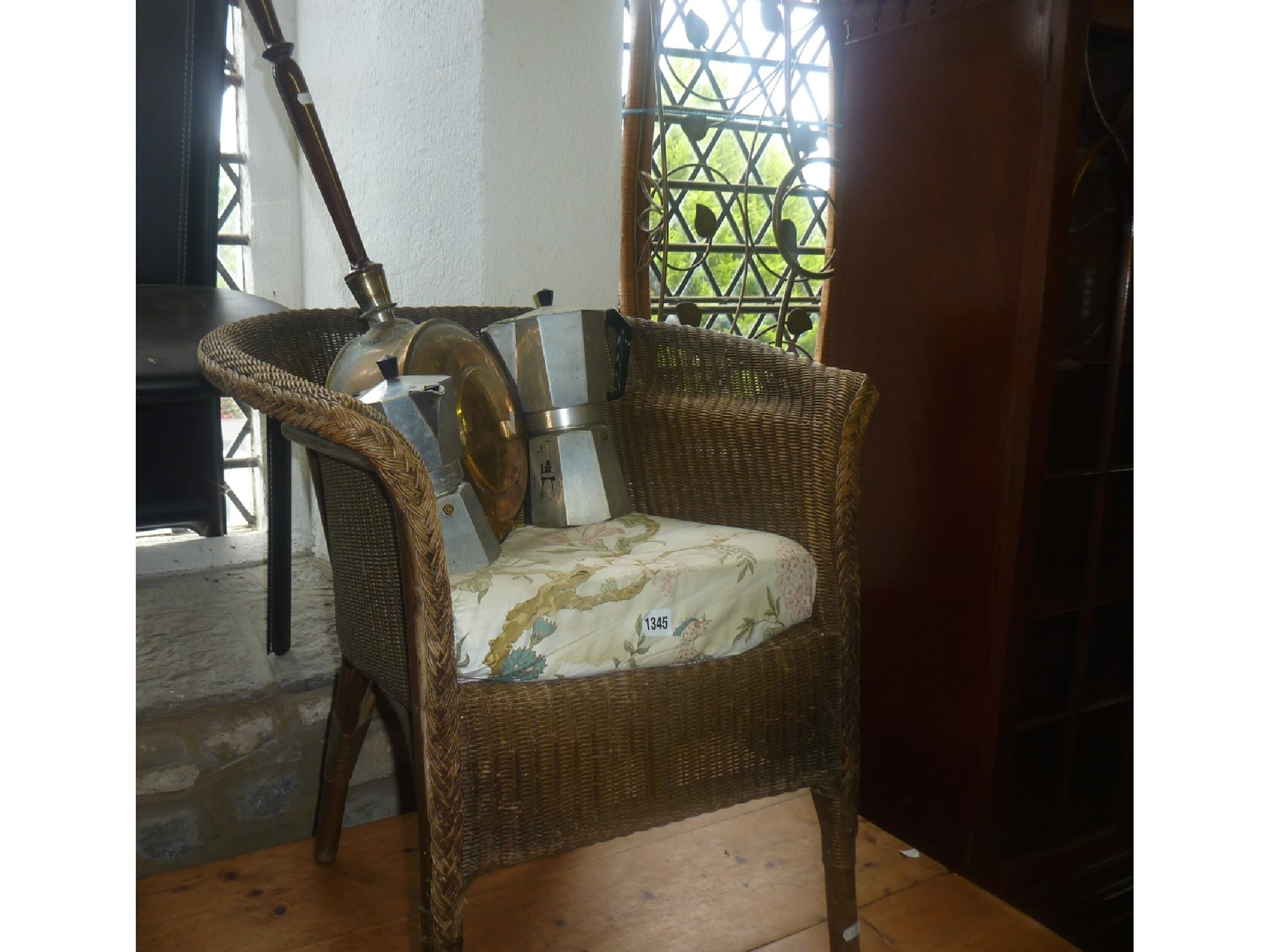 Appraisal: A Lloyd Loom basket weave tub chair with original finish