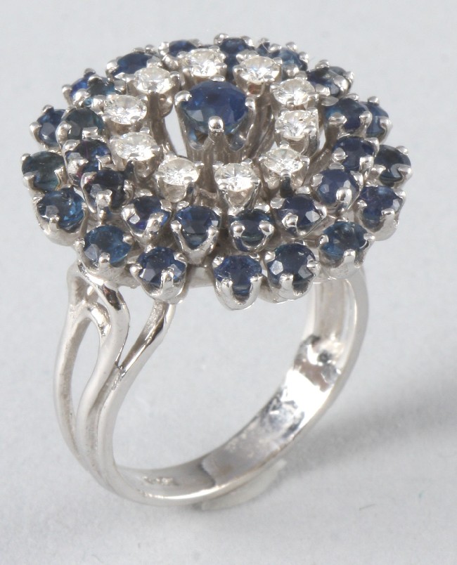 Appraisal: KW diamond ring with round sapphires Ten ctw round diamonds