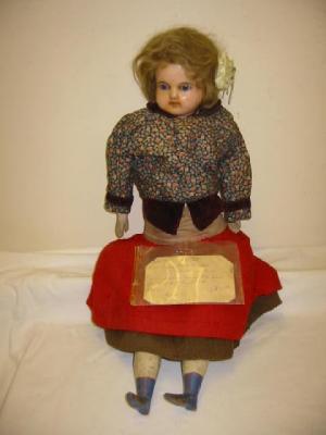 Appraisal: A wax over composition shoulder head doll with fixed blue