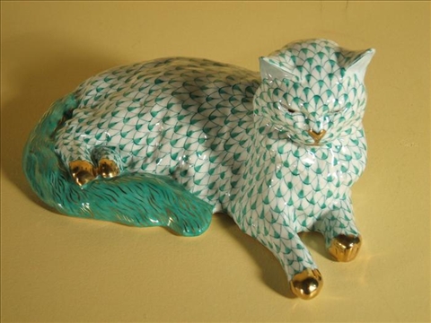 Appraisal: HEREND MODEL OF A RECUMBENT CAT Blue printed mark for