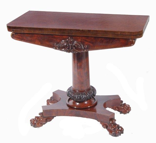 Appraisal: An early Victorian mahogany and amboyna veneered fold over card