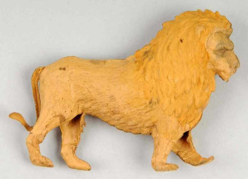 Appraisal: German Dresden Lion Ornament Description Three dimensional Folds in front