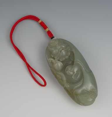 Appraisal: A Chinese Carved Jade Immortal Figurine Amulet Grayish green color