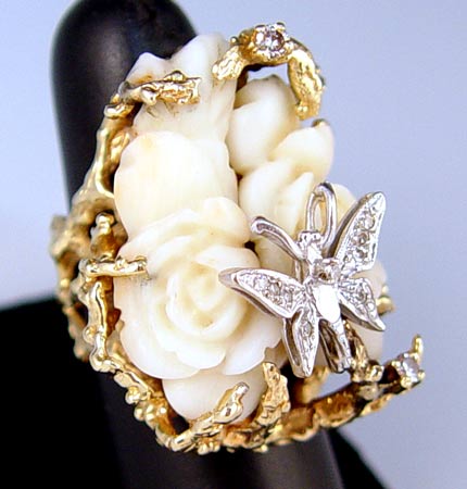 Appraisal: K CARVED CORAL AND DIAMOND BUTTERFLY RING K yellow gold