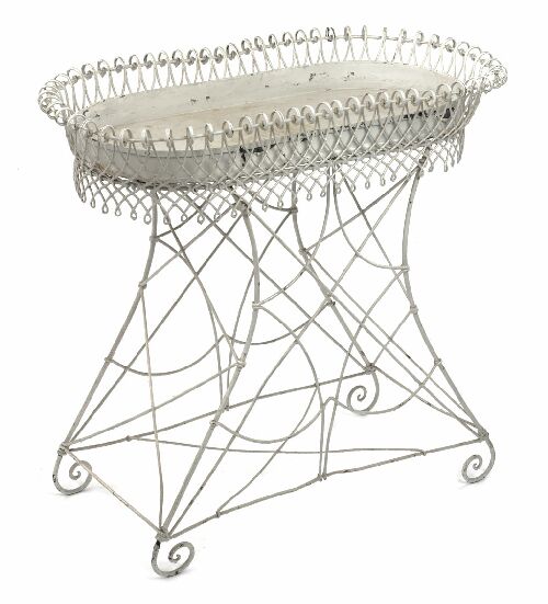 Appraisal: A white painted wirework planter the oval outscrolled basket top