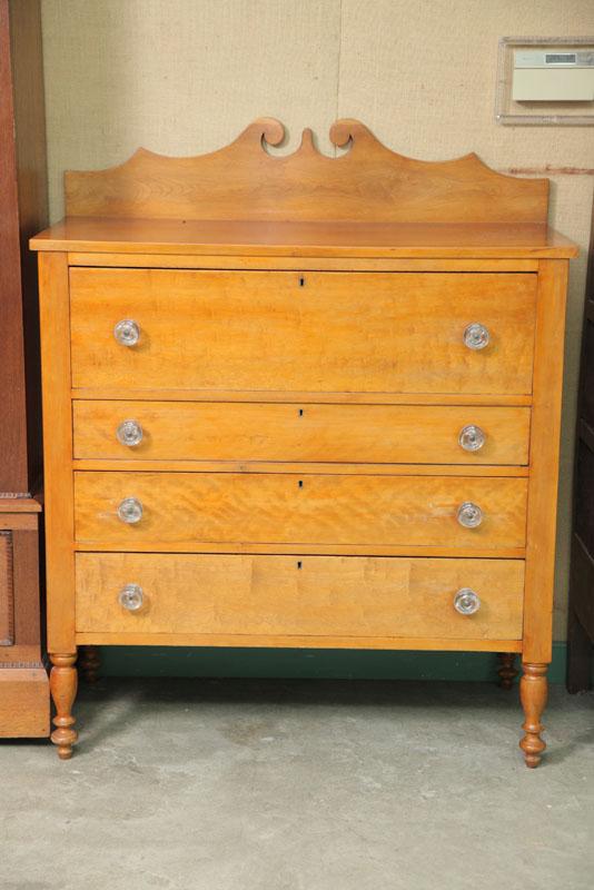 Appraisal: CHEST OF DRAWERS Cherry having a shaped crest paneled sides