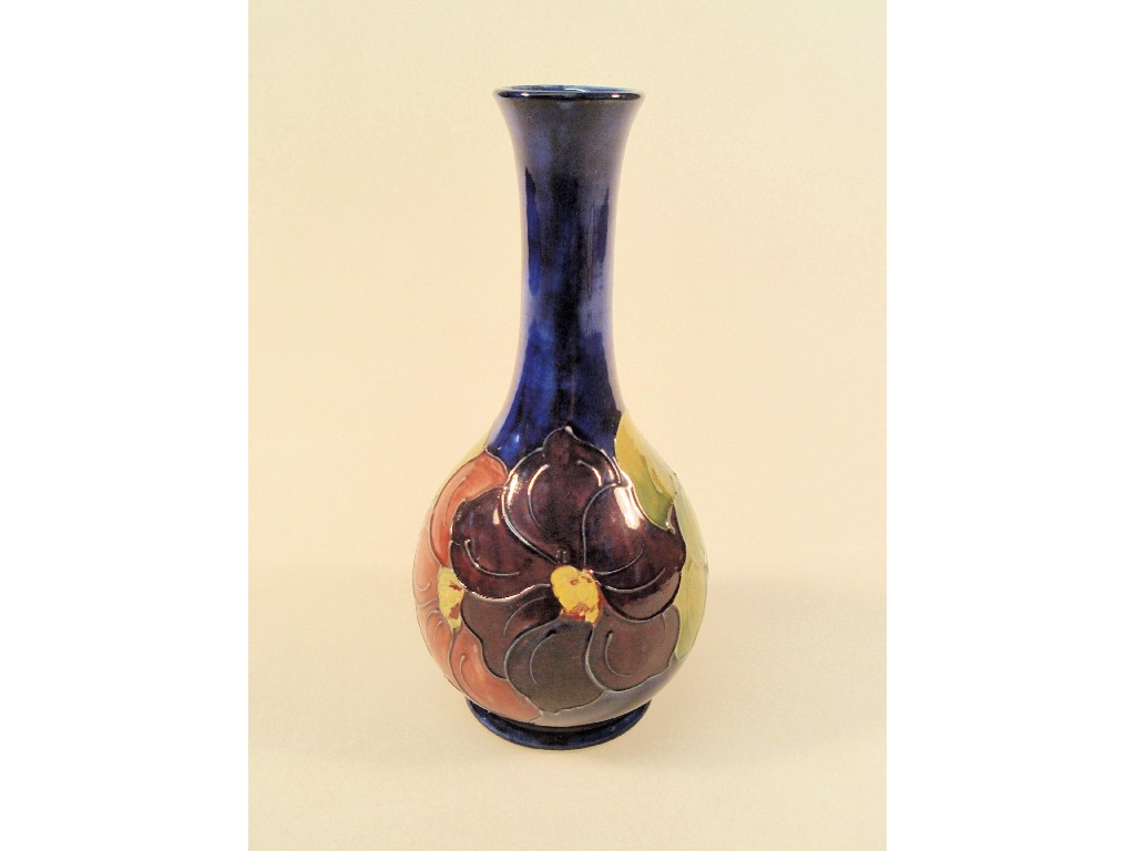 Appraisal: A Moorcroft pottery baluster vase tube lined and painted with