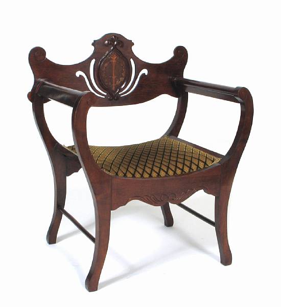 Appraisal: An Edwardian marquetry inlaid curule armchair circa height in width