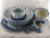 Appraisal: A Chinese vase a pair of Delft miniature vases a