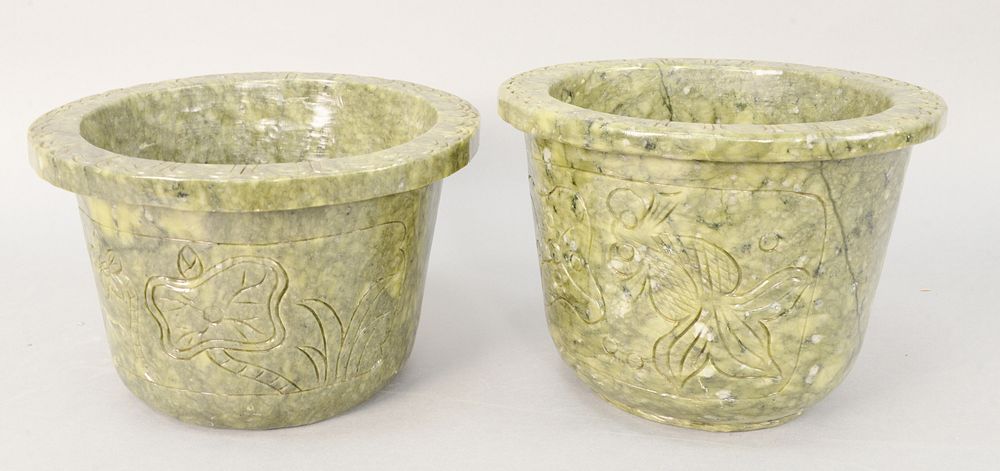 Appraisal: Two large Chinese carved green hardstone pots or planters sixes