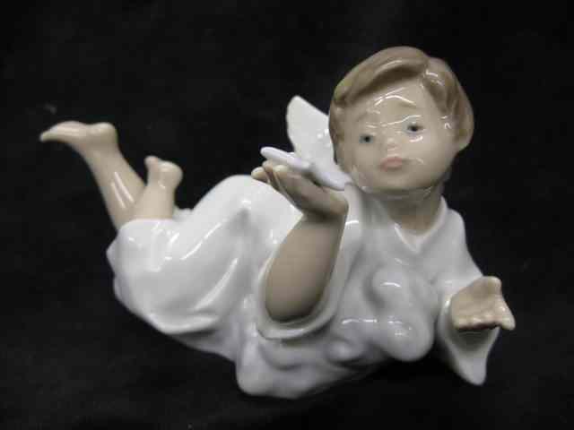 Appraisal: Lladro Porcelain Figurine of an Angel ''Making a Wish'' ''