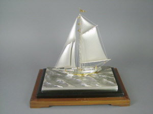 Appraisal: A modern Continental parcel gilt silver model of a sailing