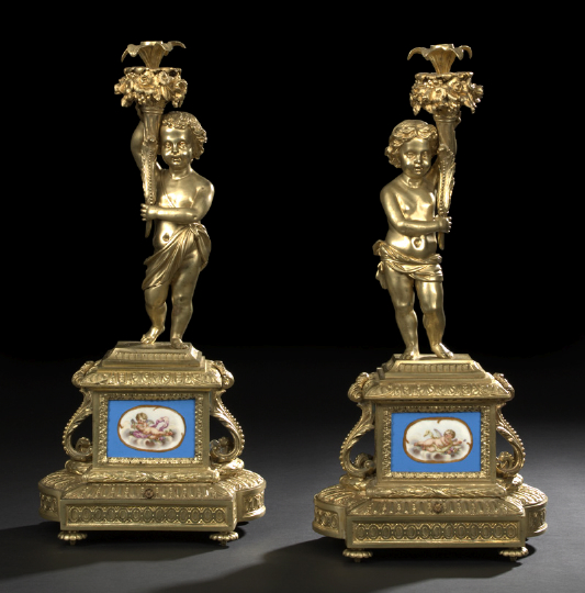 Appraisal: Large Pair of French Gilt-Brass and Sevres-Style Porcelain-Mounted Figural Candlesticks