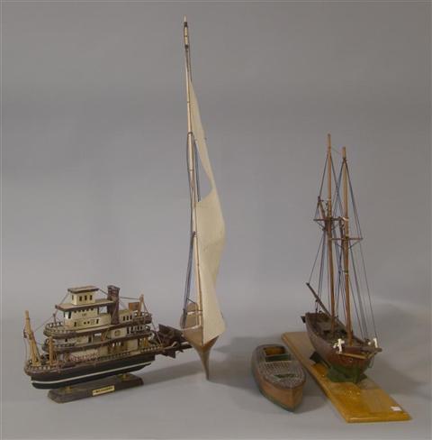 Appraisal: FOUR VARIOUS BOAT MODELS Including a carved wood sloop a