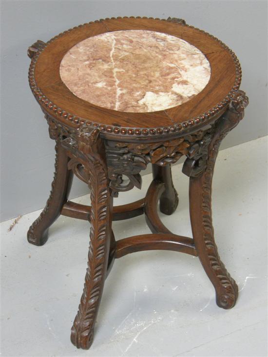 Appraisal: Chinese hardwood stand shaped top inset with pink marble carved