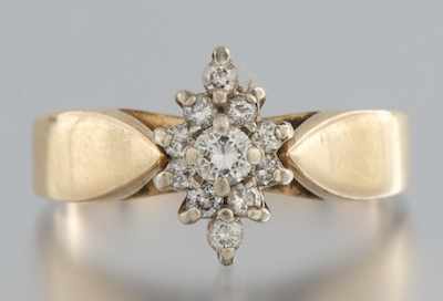 Appraisal: A Ladies' Diamond Cluster Ring k yellow gold ring with