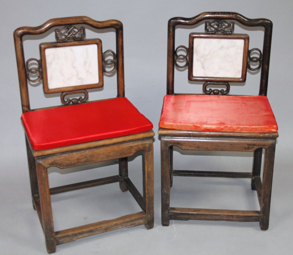 Appraisal: A pair of early thC Chinese hardwood chairs each with