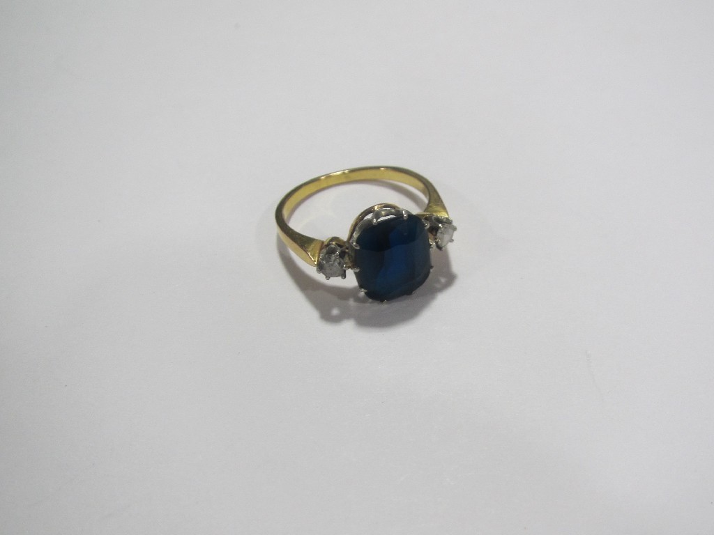 Appraisal: Eighteen carat gold synthetic sapphire and diamond three stone ring