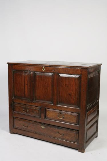 Appraisal: A GEORGE III WELSH OAK MULE CHEST the rectangular top