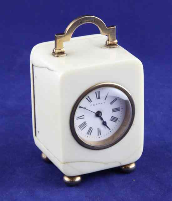 Appraisal: An Edwardian Asprey ct gold mounted ivory miniature carriage timepiece