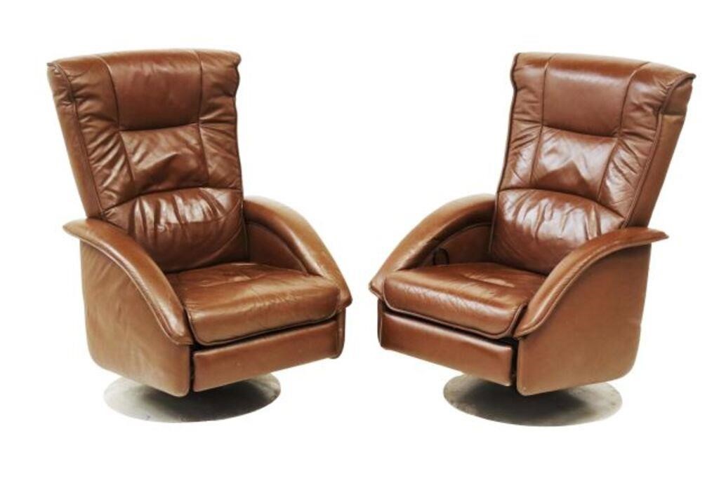 Appraisal: pair Danish modern reclining lounge chairs Unico c s brown