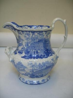 Appraisal: A VICTORIAN OPAQUE CHINA POTTERY TOILET JUG of baluster form