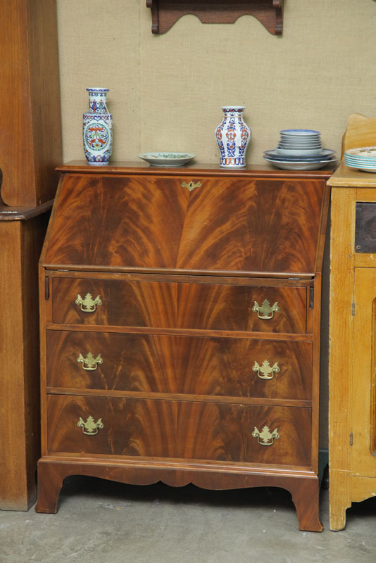 Appraisal: SLANT LID DESK With dovetail construction and brass fittings Three